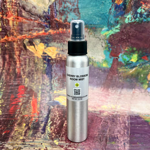 Cherry Blossom Room Mist – A premium, long-lasting home fragrance spray infused with the fresh scent of cherry blossoms and red cherries. Hand-poured in Dallas, Texas, this elegant mist eliminates odors and refreshes any space.