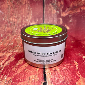 Mystic Myrrh Soy Candle in a chic black container, featuring a flickering flame that radiates the deep, mystical aroma of myrrh, perfect for relaxation.