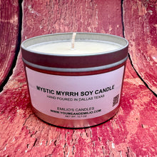 Close-up of the Mystic Myrrh Soy Candle, highlighting the smooth wax surface and elegant design, with a soft, ambient light illuminating the scene.