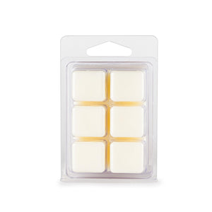 A set of Mystic Myrrh Soy Wax Melts in a clear clamshell packaging, showcasing the smooth, richly colored wax cubes ready to fill your space with a deep, aromatic scent.