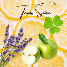 Close-up of the Texas Spice Soy Candle's label, highlighting its Apple, Clover, Lemon, and Lavender fragrance blend.